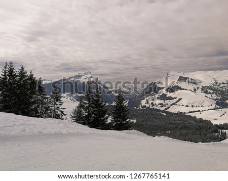Ski slopes and snow-capped mountains in Hoch-Ybrig, Switzerland.