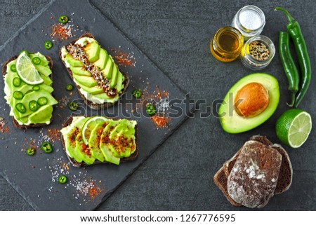 Delicious avocado toasts with beautiful toppings.