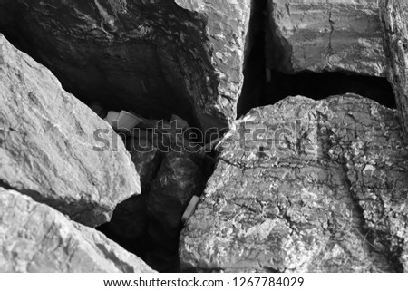 Black and white abstract picture of rock.