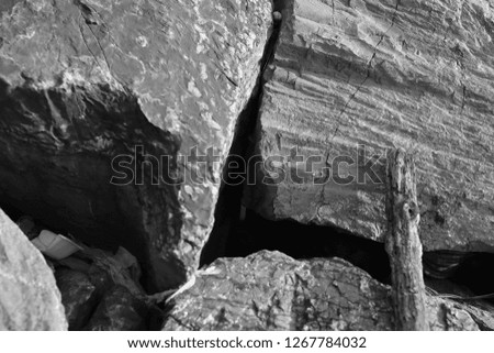 Black and white abstract picture of rock.