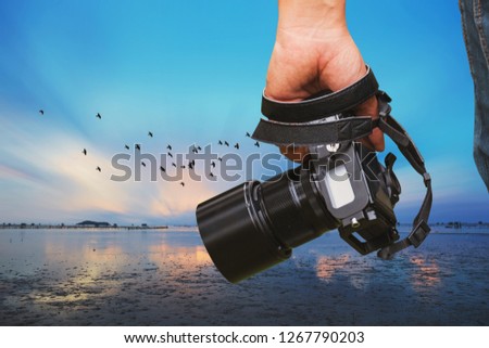 Photo camera technology. Photographer equipment. Photo creating process. Unity with nature
