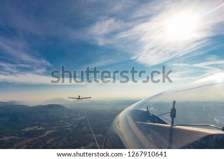 Glider on tow Royalty-Free Stock Photo #1267910641