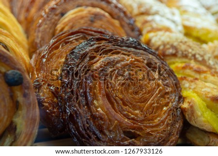Fresh baked homemade pastries in small French bakery in Provence close up