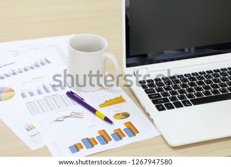 business and financial report on desk in the office