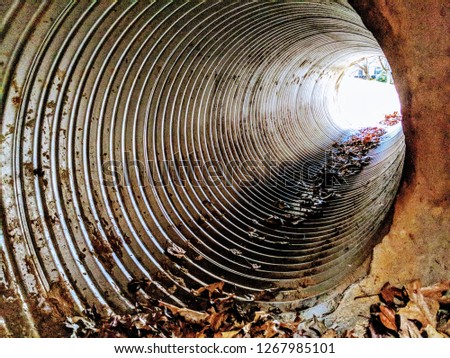 Drainage tunnel opening into the sunlight