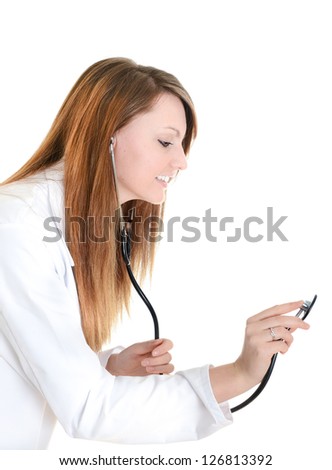 Pretty female doctor with stethoscope isolated over a white background