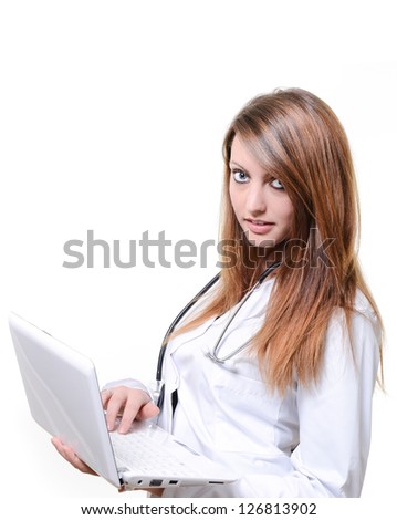 Pretty female student doctor working with notebook