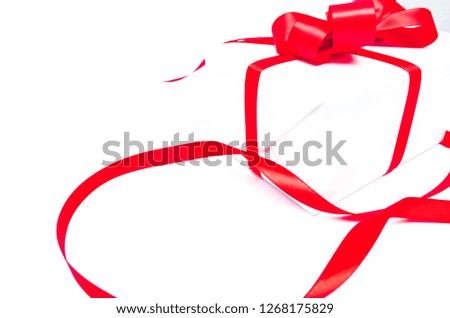 Christmas and New Year's Day , red ribbon gift box on white background