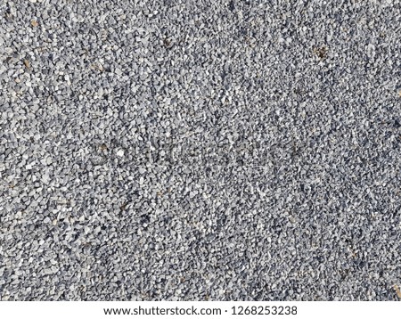Close-up of a picture with gravel stones, pebbles as a background