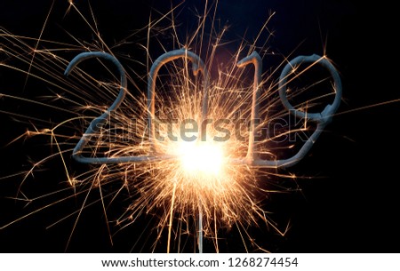 Sparkler isolated on a solid black background, 2019, happy newyear!