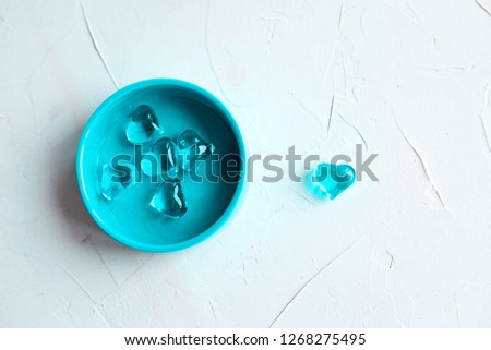 Top view of blue hearts on white background, St. Valentine's Day concept.