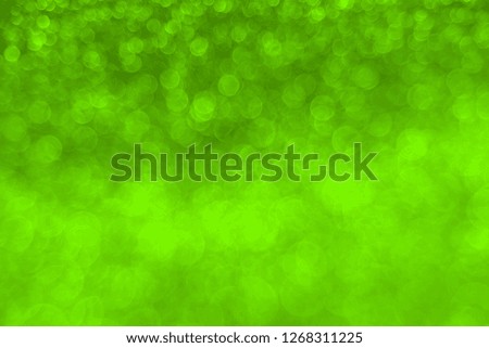 Delicate glitter bokeh Chartreuse background. Creative and moody color of the picture.