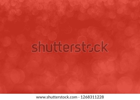 Delicate glitter bokeh Coral background. Creative and moody color of the picture.
