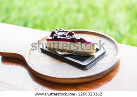 Blueberry cake on a wooden background