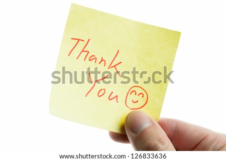 hand showing a post-it to thank you