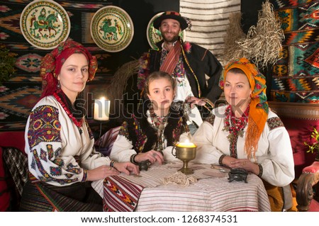 Ukrainians Hutsuls in the Carpathians in traditional ancient  costumes ornaments, which for more than a hundred years show the life and culture of our ancestors of the Slavs of Ukraine