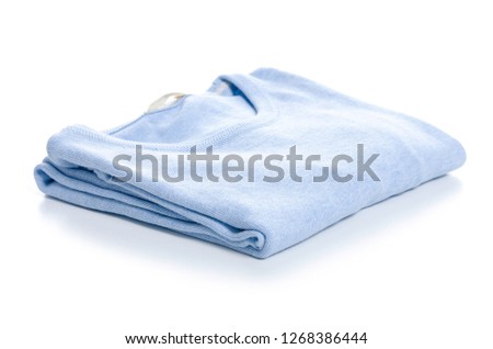 Folded blue sweater on white background isolation
