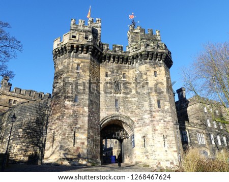 Lancaster Castle is a medieval castle in Lancaster in the English county of Lancashire. Its early history is unclear, but may have been founded in the 11th century on the site of a Roman fort. Royalty-Free Stock Photo #1268467624