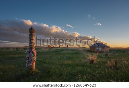 Sunset in steppe Khakasia. Royalty-Free Stock Photo #1268549623