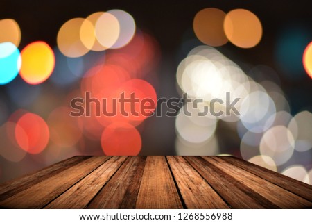 Empty wooden table and bokeh background