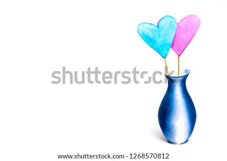 Love concept. Colorful paper handmade hearts in flower vase isolated on white background. Beautiful abstract art and colorful illustration of paper