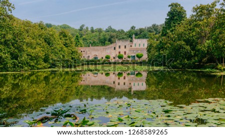 Castello del Catajo, a Venetian patrician house, and its reflectiton in the pond in the garden, near Padua, Italy Royalty-Free Stock Photo #1268589265