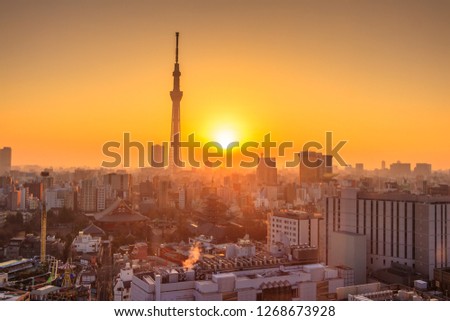 The sun rises over the city of Tokyo in the morning. Japan