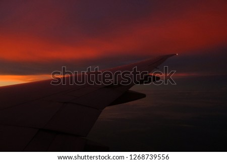 Amazing dramatic golden sky at the sunrise   which  photograph on the plane. the picture straight out of the camera 