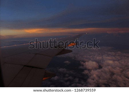 Amazing dramatic golden sky at the sunrise   which  photograph on the plane. the picture straight out of the camera 