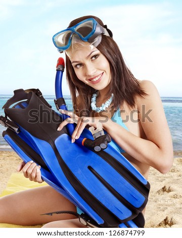 Girl wearing diving gear.  Isolated.