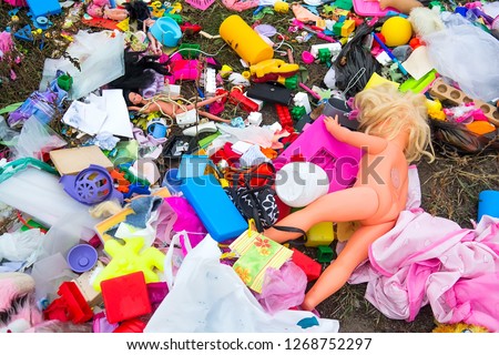 Pile of abandoned plastic children's toys for reuse and recycle. Selective focus Royalty-Free Stock Photo #1268752297