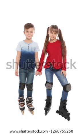 Boy and girl with inline roller skates on white background
