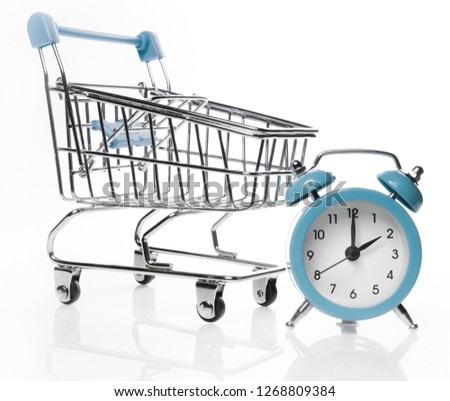Time to buy. Watch and trolley from the store for shopping.