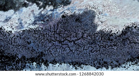 prime asphalt, black gold, polluted desert sand, tribute to Pollock, abstract photography of the deserts of Africa from the air, aerial view, abstract expressionism, contemporary photographic art,