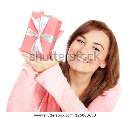 Picture of a happy young adult girl with gift box, cheerful female isolated on white background, pretty woman portrait with romantic present, holiday celebrations concept