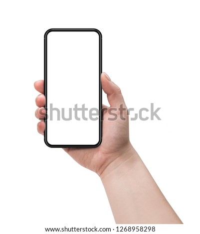 Woman holding smartphone with blank screen. 