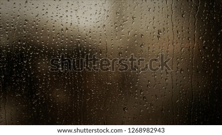 Natural water drop on glass Royalty-Free Stock Photo #1268982943