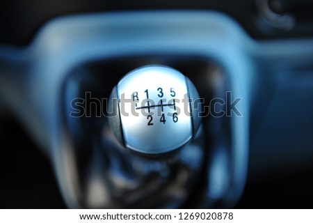 Car interior. manual transmission gear shift. Gray color