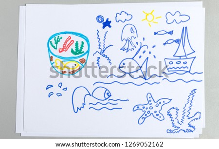Kid drawings set of different sea animals and elements - child outline scribble of sailboat on waves, fish in wild life and aquarium, starfish and jellyfish isolated on white background.