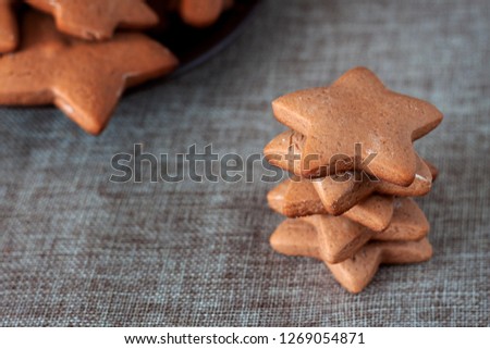Baked gingerbreads are on the table. Close-up