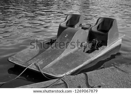 Motor boat in a park lake.