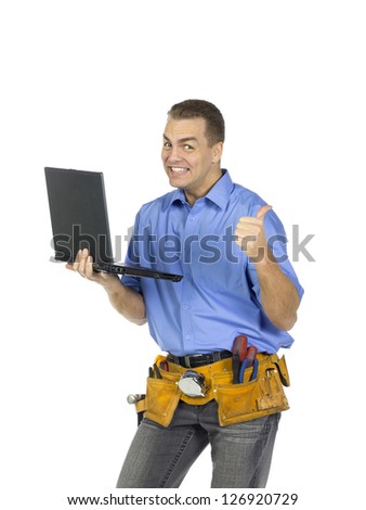 Portrait of construction worker smiling while holding a laptop isolated on white background