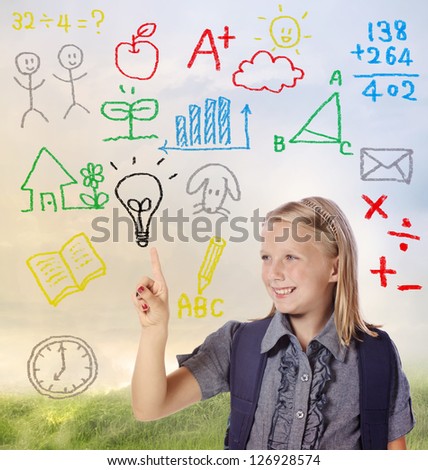 Young blond school girl with hand written school themed texts and pictures