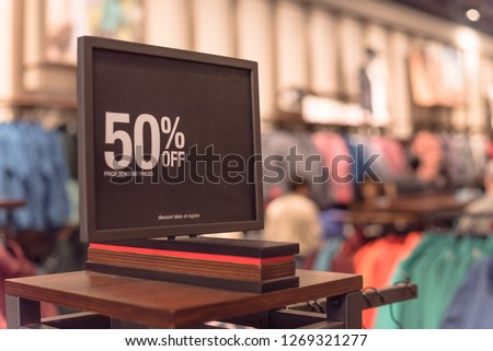Red tag sale 50 percent discount at outdoor department store in Texas, USA. Big reductions concept for Black Friday and Holiday season sale of outerwear and gear. Business fashion and advertisement
