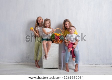 children sit with fresh vegetables healthy eating fruit
