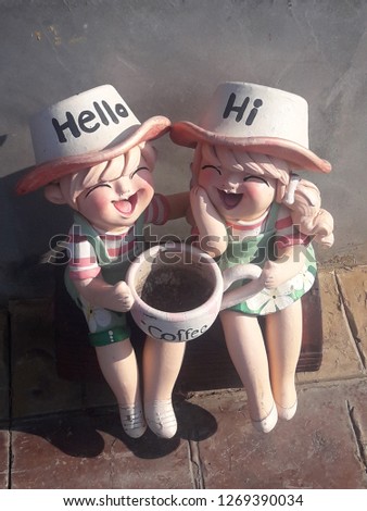 Lovely boy and girl statue