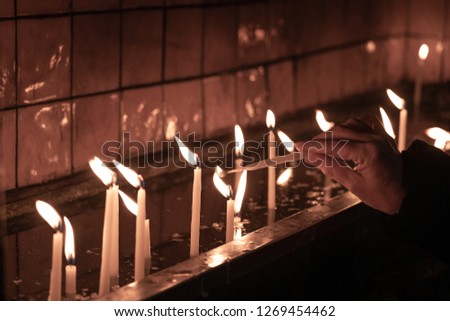 candles in church, wishing christians