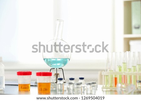 Laboratory glassware on table indoors. Research and analysis