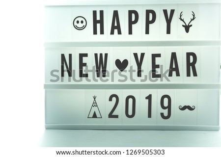 Light box.White label, There is a letter written that Happy New Year 2019.Put on a haystack.  concept:New Year's Day festival.Used as a background image