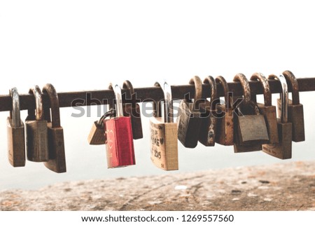 Love rusty padlocks in a white background
